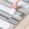 Heiße Schmelzklebendes doppeltes mit Seiten versehenes Teppich-Band-Baumwollstoff-Material für das Binden
